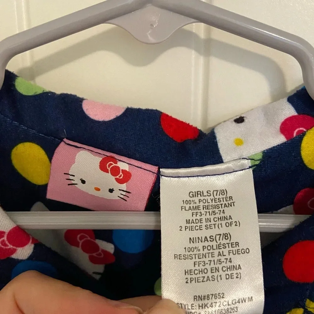 Hello Kitty girl’s polka dot print button up pajama shirt — size‎ 7/8